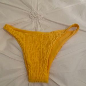 yellow bikini bottoms w popcorn material
